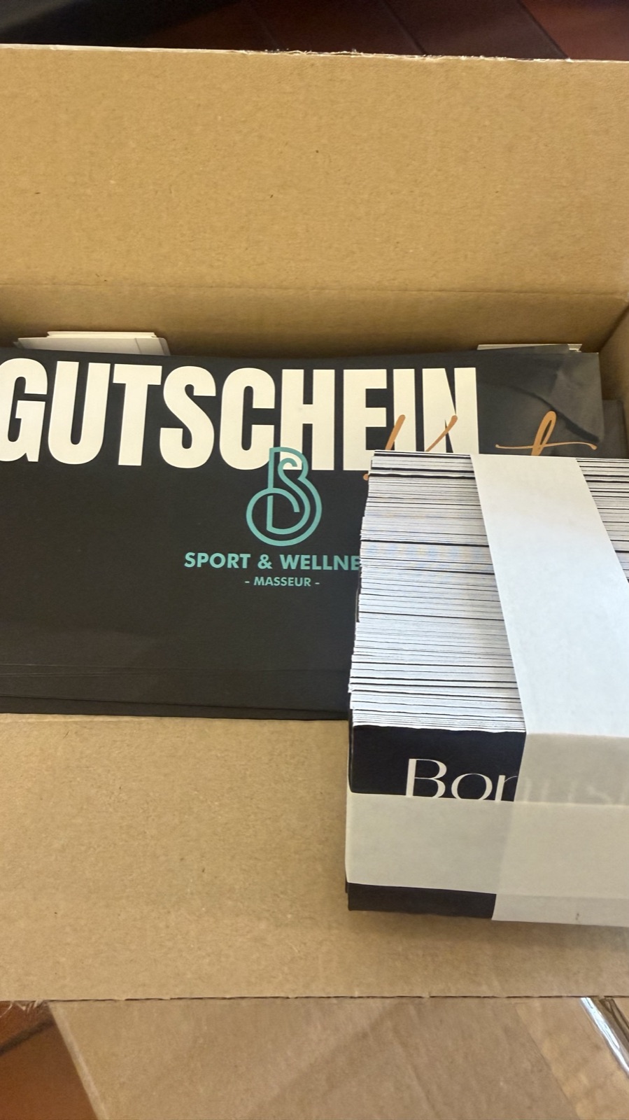 Gedruckte Gutscheine in Verpackung